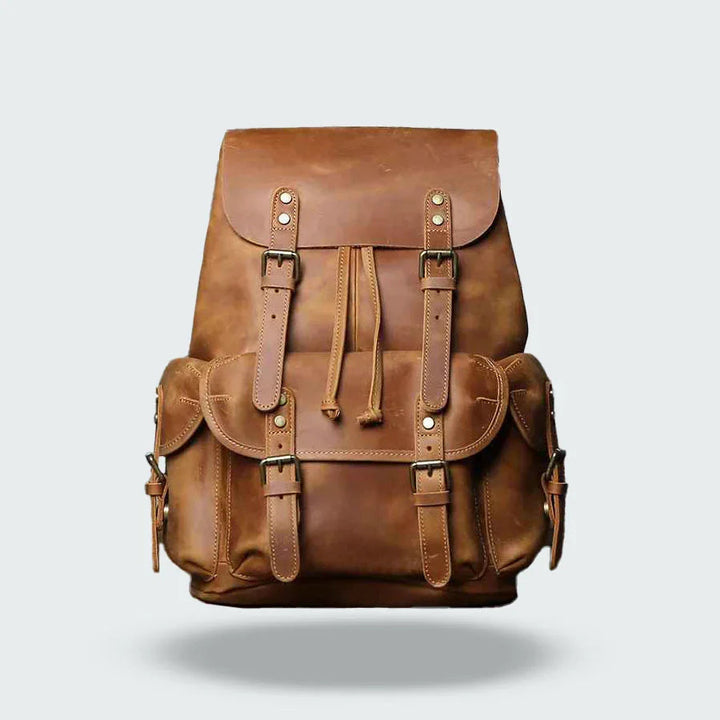 Mochila vintage marrón oscuro de hombre. Diseño elegante y amplio interior para organización en viajes urbanos.