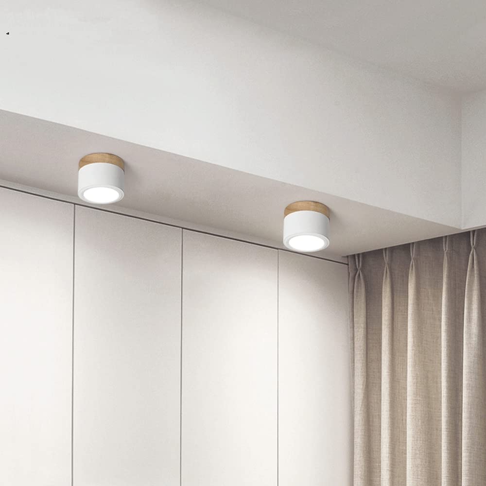 Foco de techo LED cilíndrico, diseño nórdico, iluminación interior elegante.
