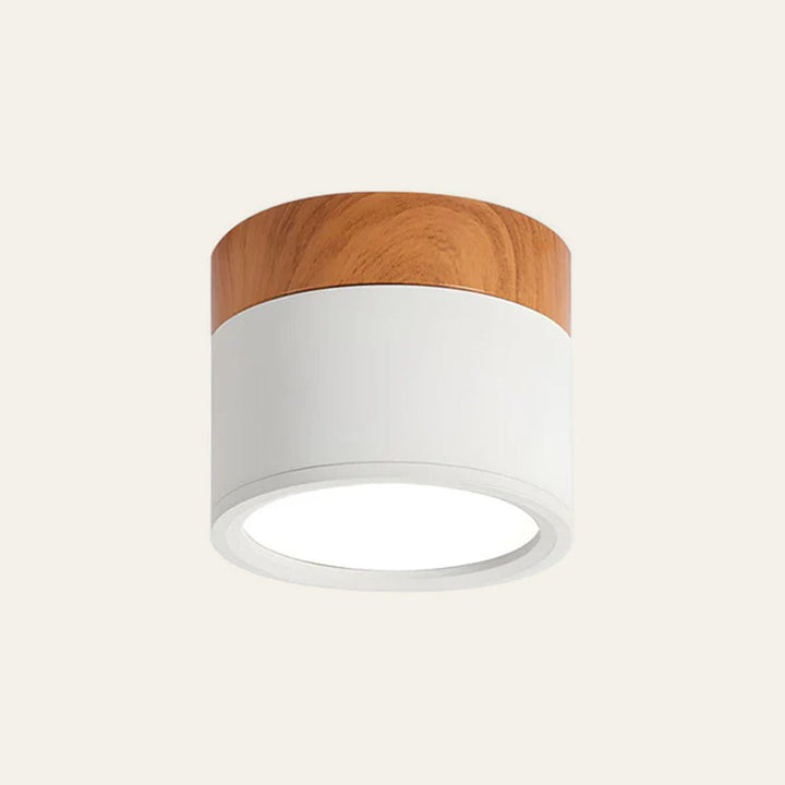 Iluminación LED de techo cilíndrica, luz cálida para un ambiente acogedor.