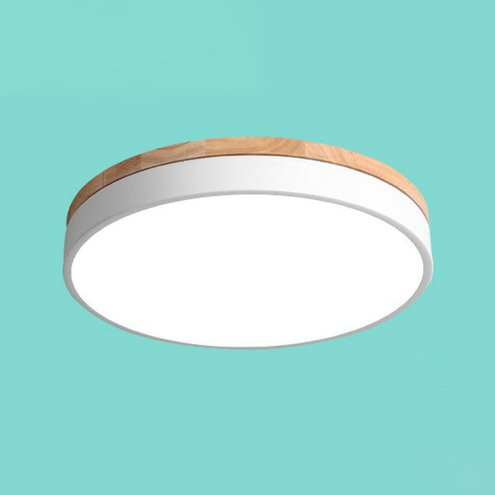 Lámpara de techo LED circular, diseño moderno empotrado para una iluminación interior eficiente.