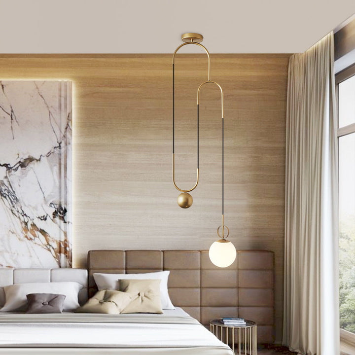 Lámpara colgante moderna esférica, ideal para decoración interior y salones contemporáneos.
