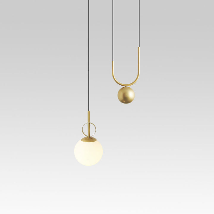 Lámpara colgante de diseño esférico, ofrece luz individual para una decoración interior sofisticada.