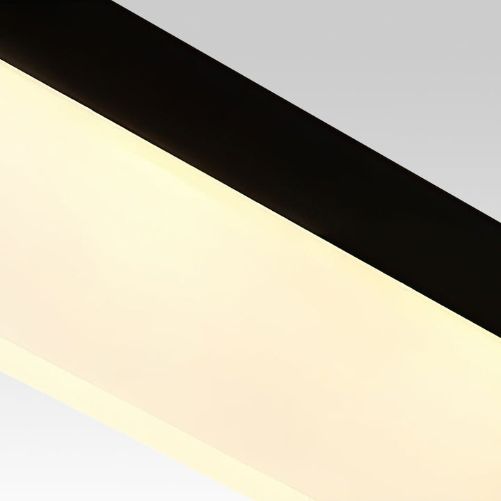 Iluminación interior moderna con lámpara LED colgante rectangular, diseño minimalista para el hogar.