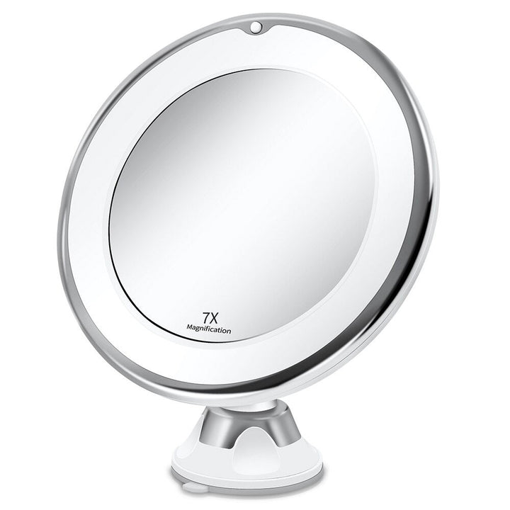 Espejo de maquillaje LED con aumento 10X, ideal para aplicar cosméticos con precisión profesional y detalle.
