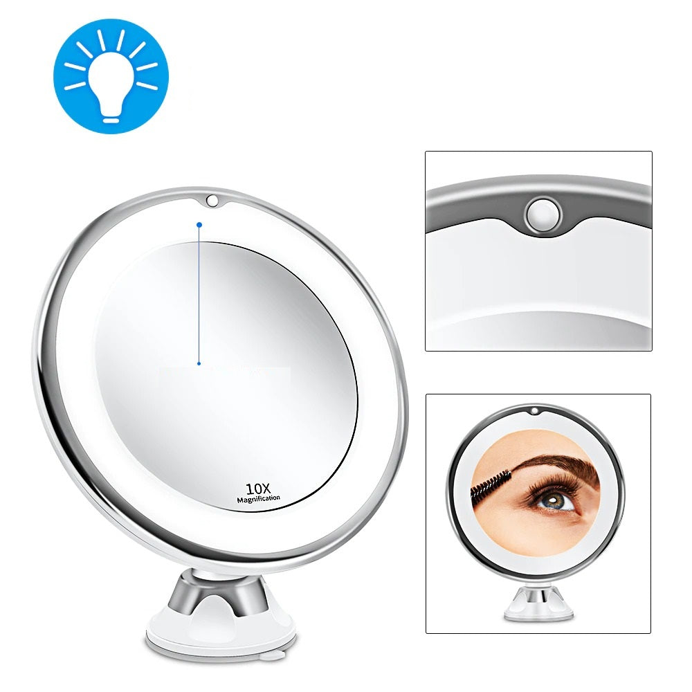 Espejo cosmético LED iluminado con ventosa y aumento 10X. Perfecto para maquillaje detallado en tocador o viajes.
