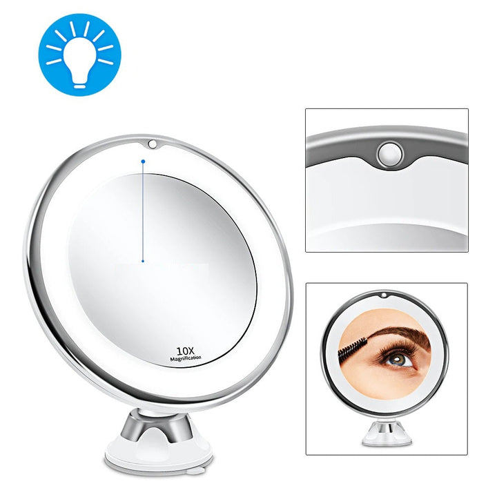 Espejo cosmético LED iluminado con ventosa y aumento 10X. Perfecto para maquillaje detallado en tocador o viajes.