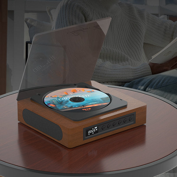 Reproductor de CD portátil retro con Bluetooth y USB-C, diseño vintage para audio de alta calidad.