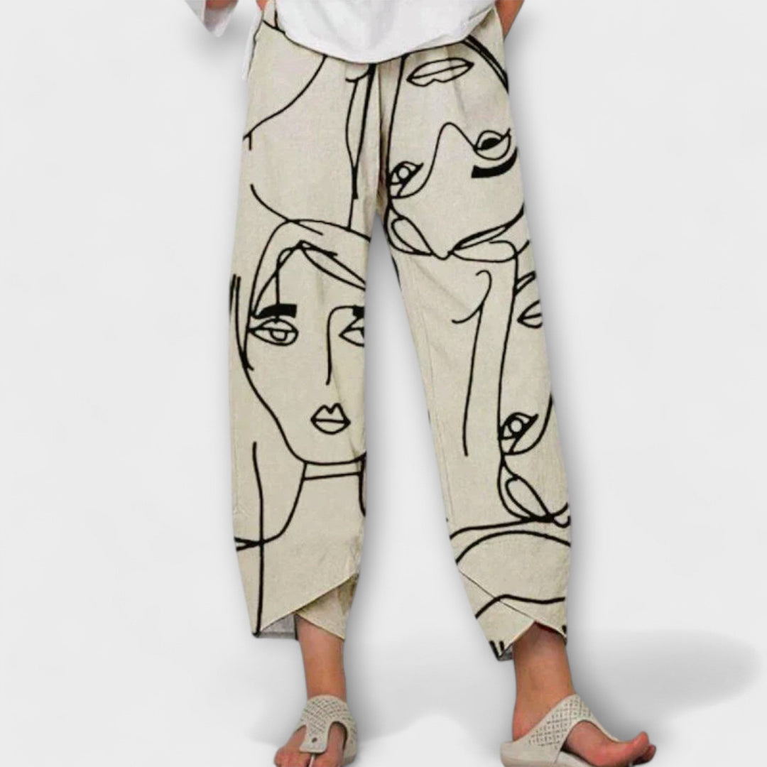 Pantalón de mujer beige con estampado artístico, cintura elástica. Ideal para moda femenina casual de verano y primavera.