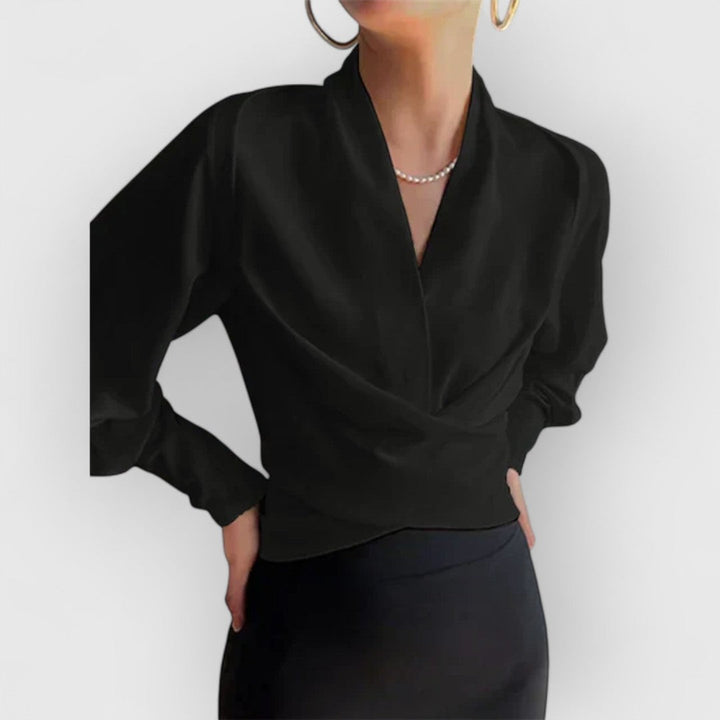 Blusa elegante para mujer con mangas abullonadas, un top femenino esencial para tu ropa de diario.