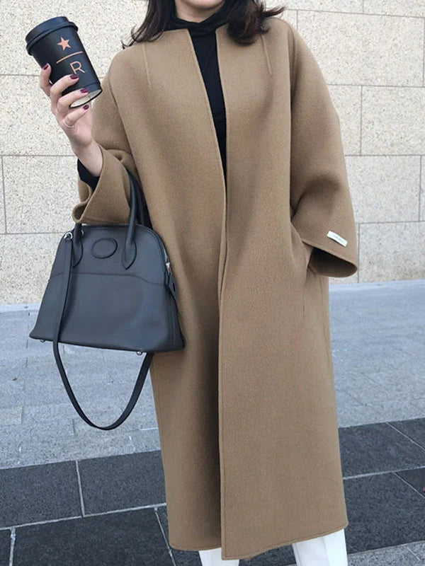 Abrigo largo de lana elegante para mujer, estilo clásico ideal para el invierno.