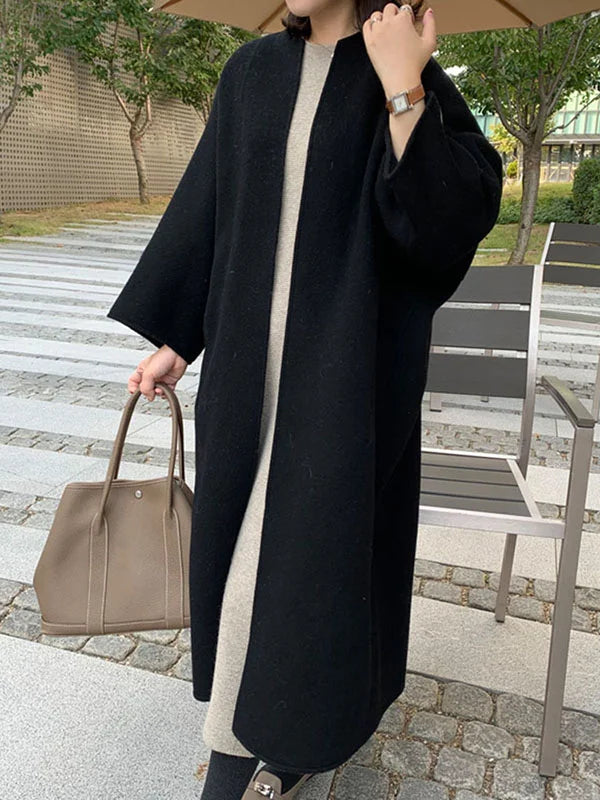 Sofisticado abrigo de lana para mujer, con corte clásico y elegante, ideal para el invierno.