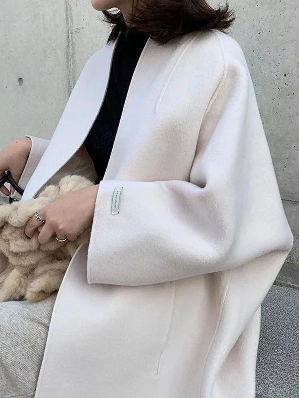 Abrigo de lana clásico para mujer, una prenda elegante y esencial para el estilo invernal.