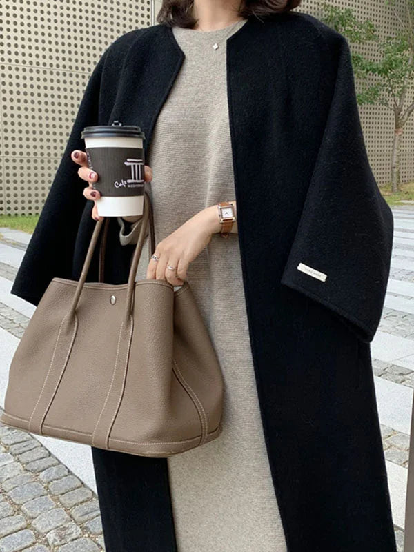 Diseño de abrigo largo de lana para mujer, clásico y elegante, perfecto para la moda de invierno.
