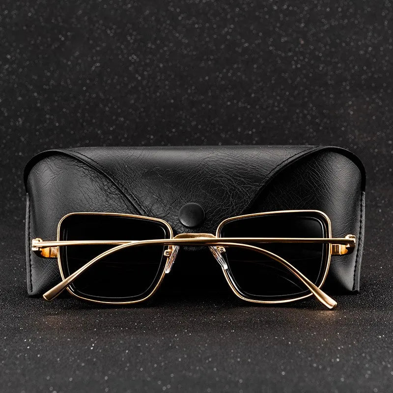 Gafas de sol de moda cuadradas retro, unisex, con protección UV400 y elegante montura metálica.