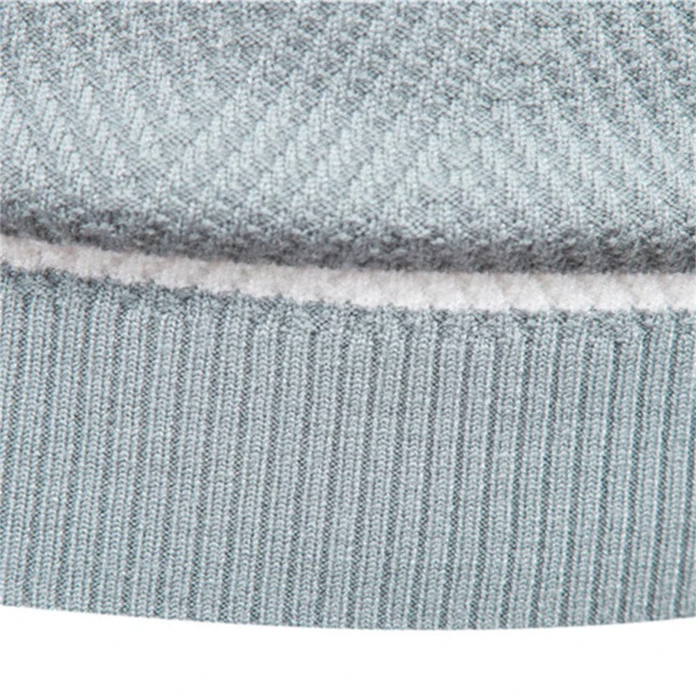 Jersey de punto elegante para hombre con cuello redondo y mangas largas, ideal para ropa casual masculina.