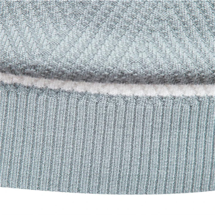 Jersey de punto elegante para hombre con cuello redondo y mangas largas, ideal para ropa casual masculina.