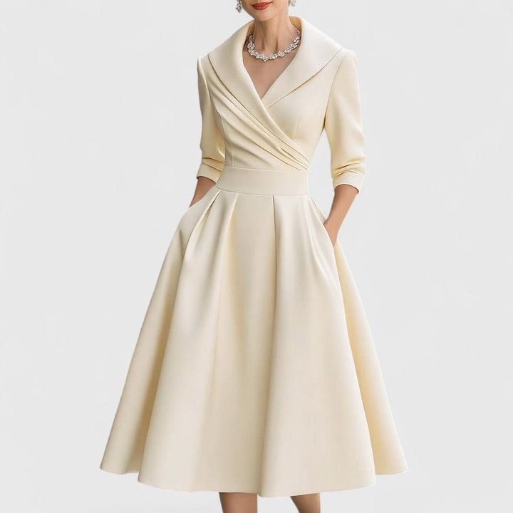 Atractivo vestido midi mujer, elegante y versátil, con escote en V y mangas 3/4. Ideal para fiesta y ocasiones.