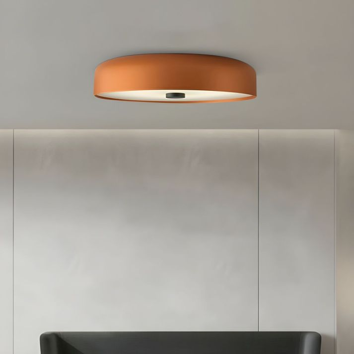 Moderna lámpara de techo LED, diseño redondo minimalista, óptima para iluminación de sala o estudio.