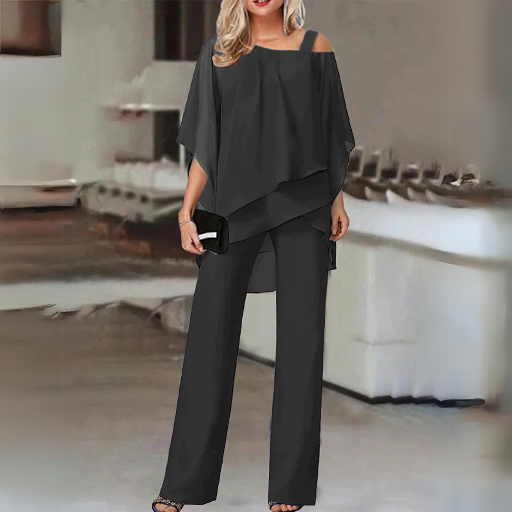 Conjunto de dos piezas moderno y versátil para mujer. Top manga larga y pantalón cómodo para oficina y casual.