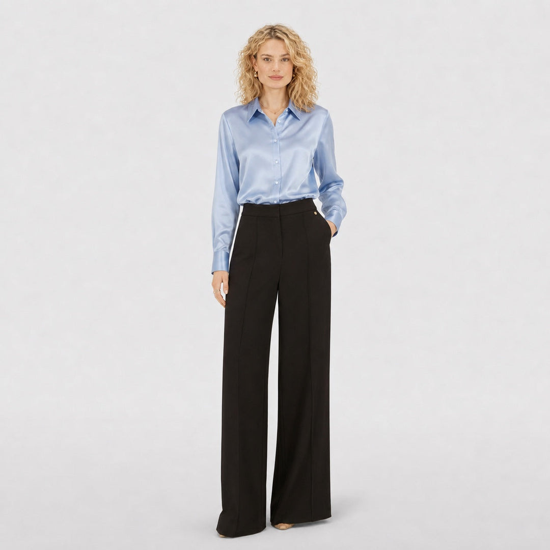 Blusa de primavera para mujer, chic y entallada. Mangas largas y cuello solapa. Estilo formal.