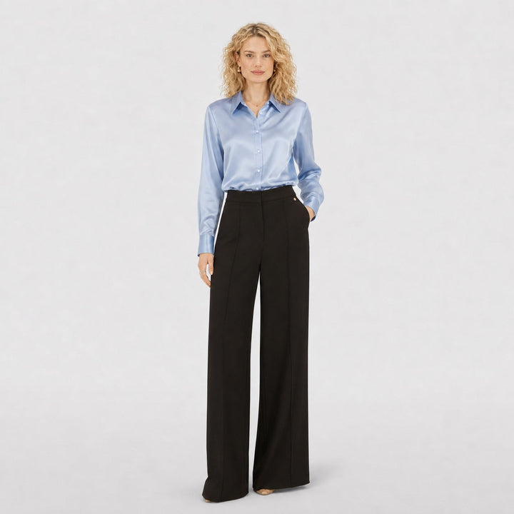 Blusa de primavera para mujer, chic y entallada. Mangas largas y cuello solapa. Estilo formal.