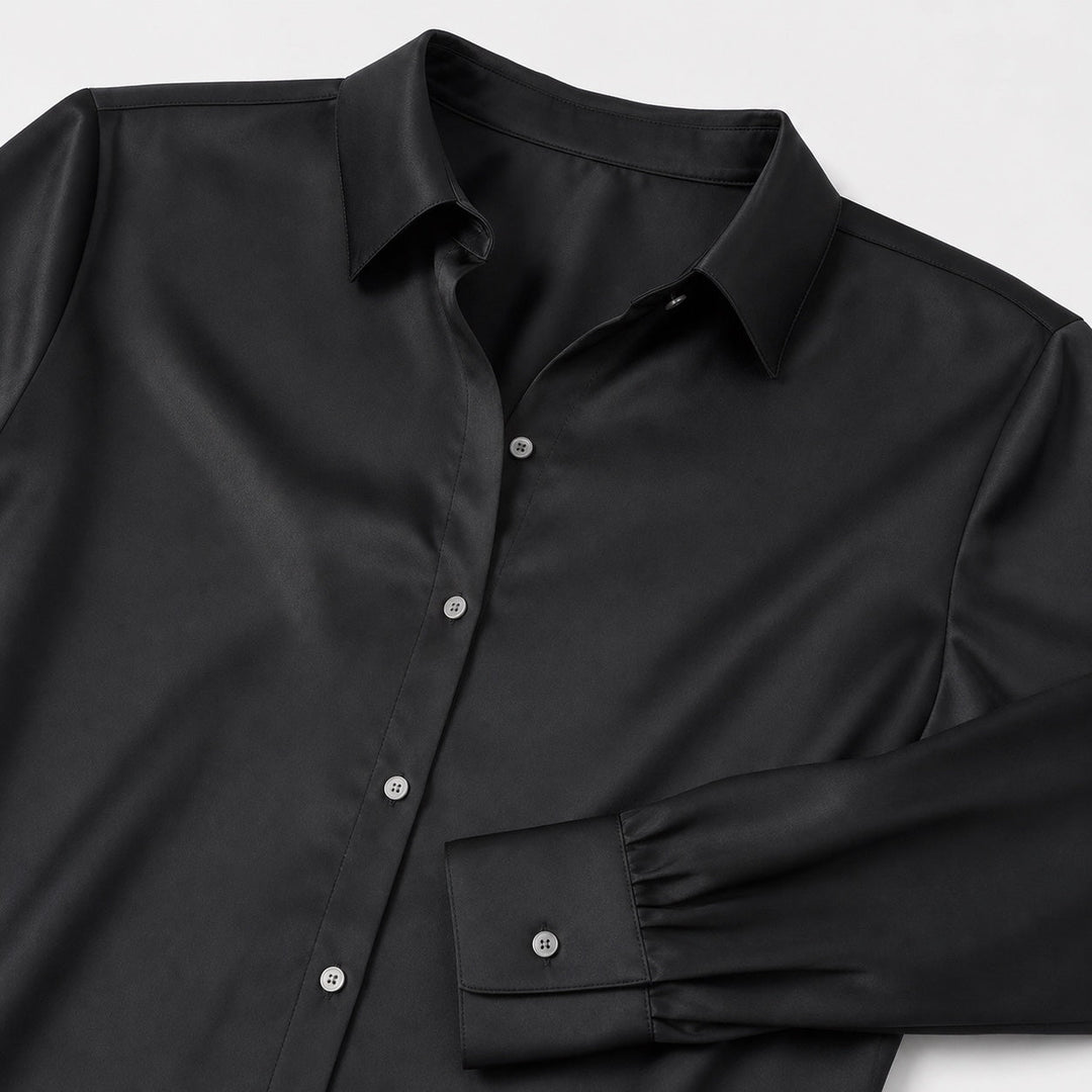 Blusa elegante para mujer con cuello solapa, manga larga. Entallada, ideal para looks de oficina.