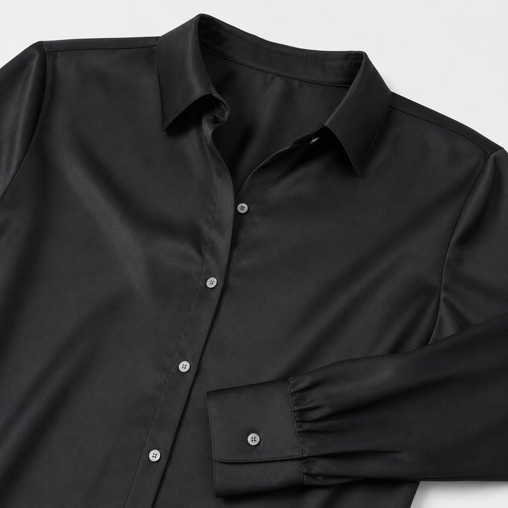 Blusa elegante para mujer con cuello solapa, manga larga. Entallada, ideal para looks de oficina.