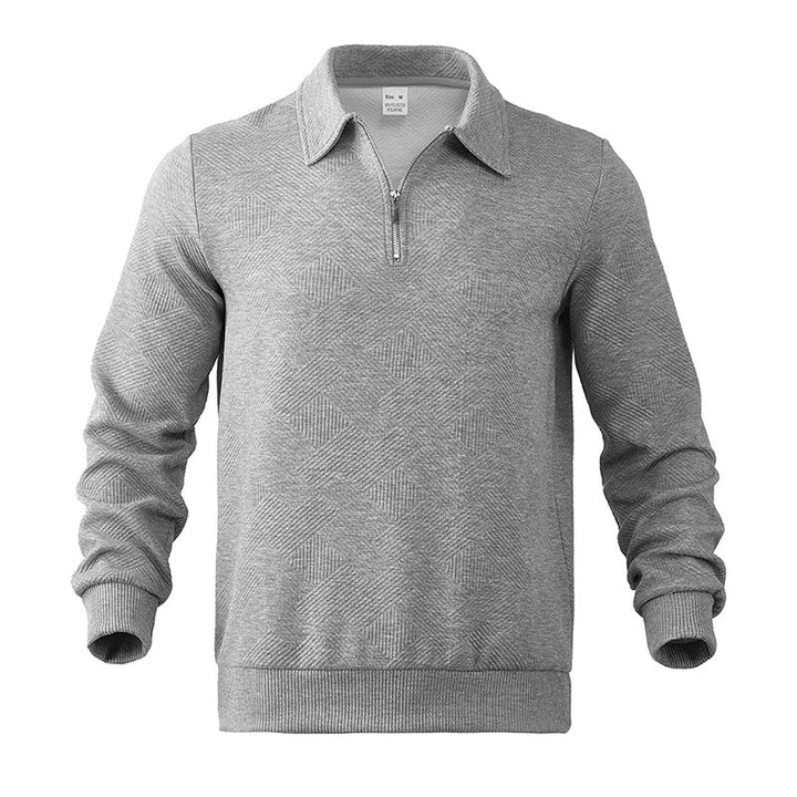Hombre con suéter de punto ZENO de media cremallera, look casual de invierno. Prenda versátil y con estilo.