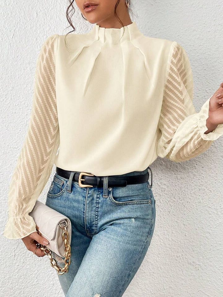 Blusa de mujer SYLVIA con mangas transparentes, elegante y sofisticada para moda femenina.