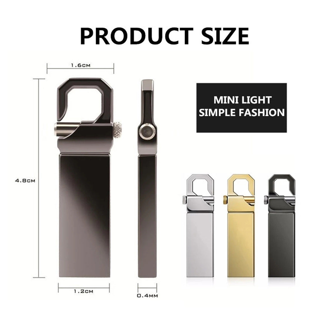 Memoria USB 2TB plateada, compacta y portátil, perfecta para llevar tus archivos y hacer copias de seguridad.
