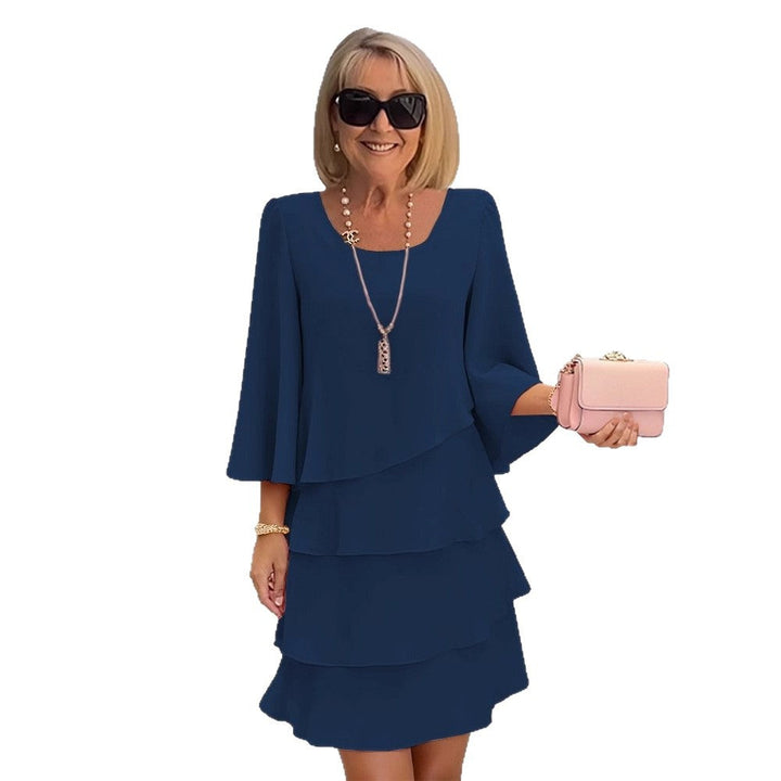 Look completo de vestido midi elegante para mujer, con volantes, corte A-line. Ideal para cualquier ocasión.