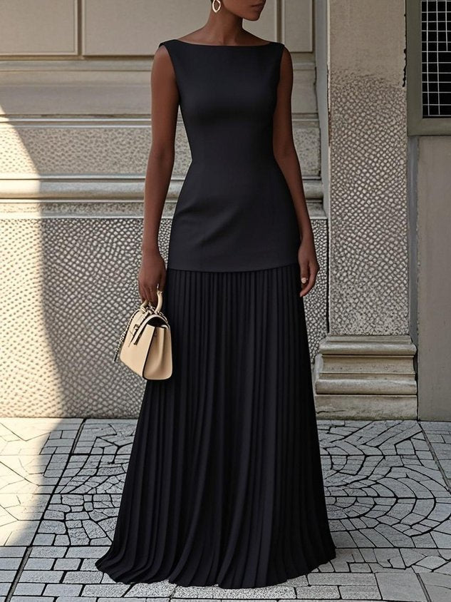 Vestido maxi plisado fluido para mujer, cómodo y atemporal, ideal para eventos de verano o fiesta.