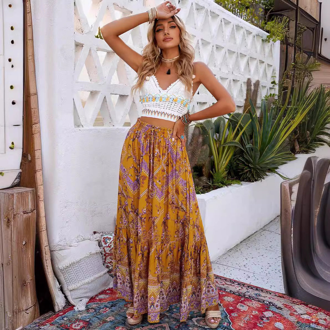 Falda larga de mujer con cintura alta, diseño bohemio y caída fluida. Ropa de verano versátil y cómoda.