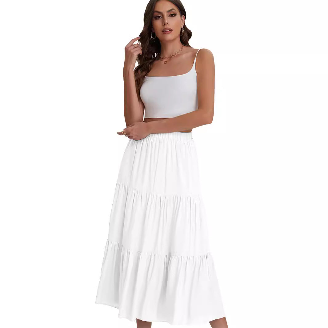 Falda midi mujer BASILISA de cintura alta con volantes. Prenda de estilo elegante y casual para verano.