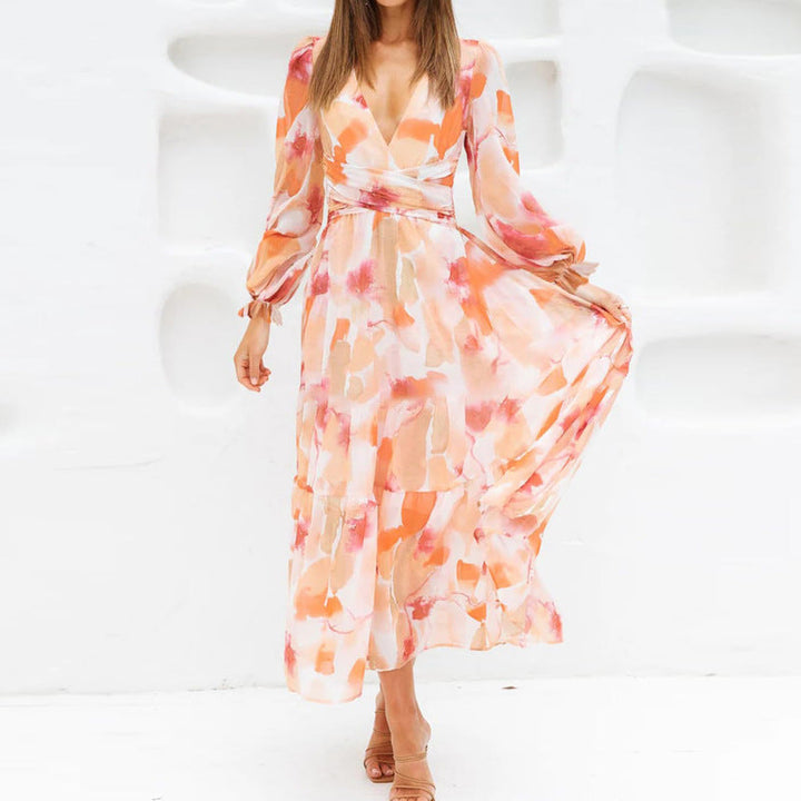 Vestido romántico para mujer. Midi floral, escote cruzado. Diseño de vuelo, ideal para casual.