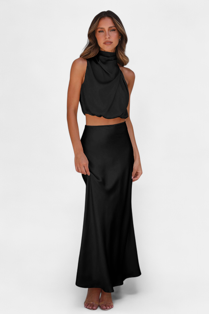 Conjunto elegante de falda y top con espalda descubierta para mujer, moda sofisticada.