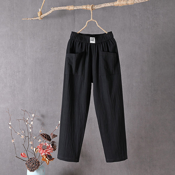 Pantalones cómodos de mujer, ajuste suelto y tejido de lino-algodón. Estilo versátil casual para primavera/verano.