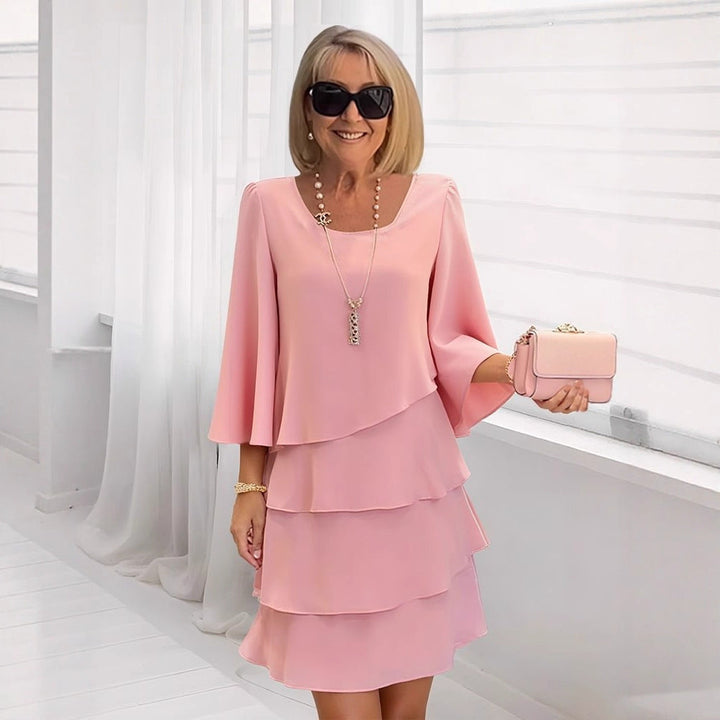 Vestido midi elegante para mujer con volantes y corte A-line, ideal para primavera y verano.