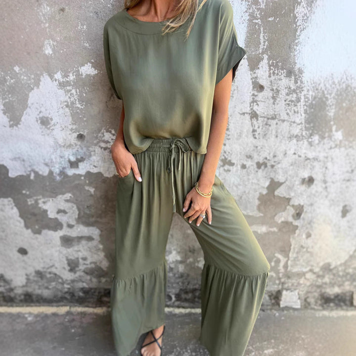 Conjunto de lino para mujer, blusa fluida y pantalón relajado, ideal para verano fresco y elegante. Comodidad casual.