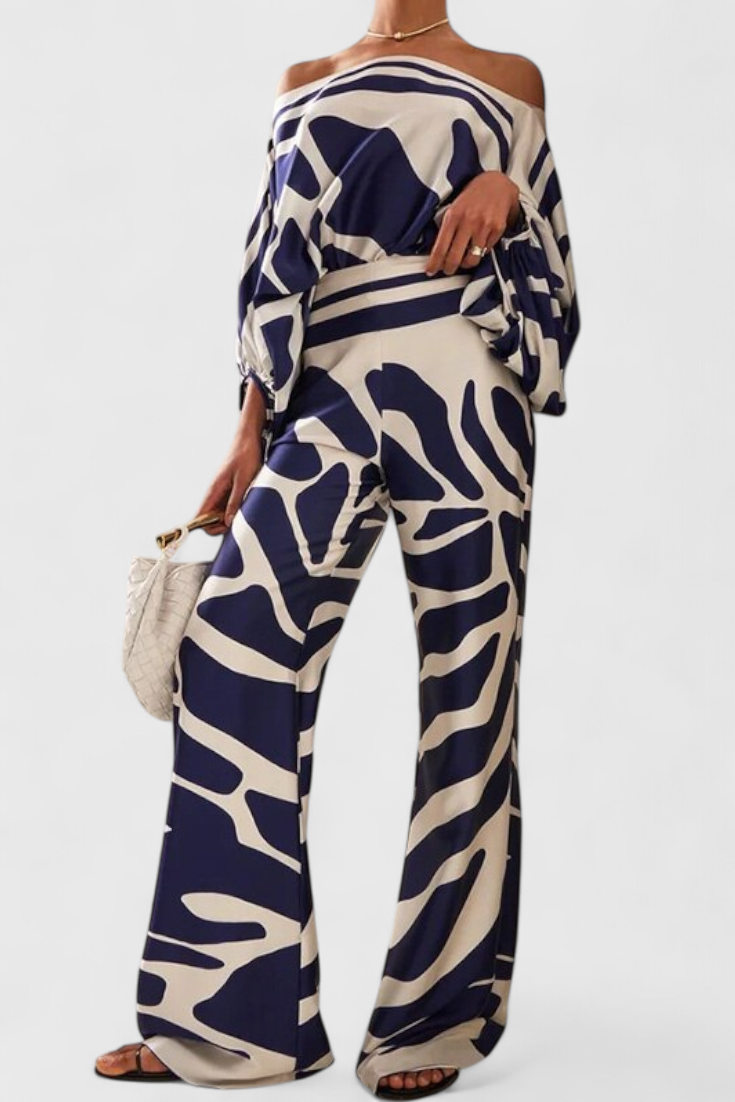 Conjunto de dos piezas: blusa casual de hombros caídos y pantalón ancho estampado floral. Comodidad y estilo mujer.