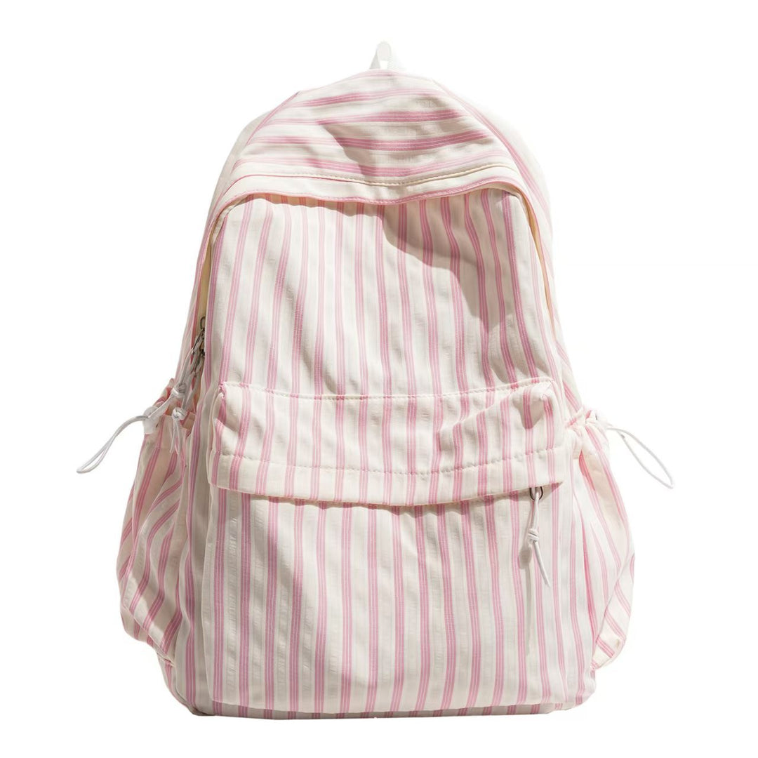 Mochila de moda a rayas para mujer, ideal para viajes cortos, con buena organización interna.