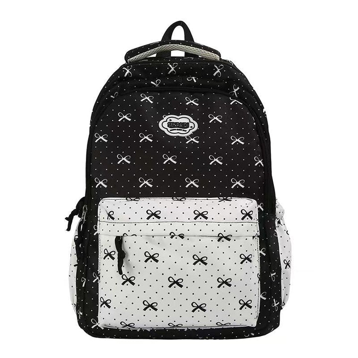 Mochila escolar duradera para niñas con lazos, diseño elegante y comodidad garantizada para el día a día.