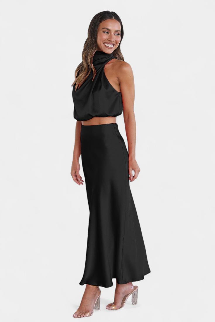Conjunto de falda y top de fiesta para mujer, espalda descubierta elegante y moderno.