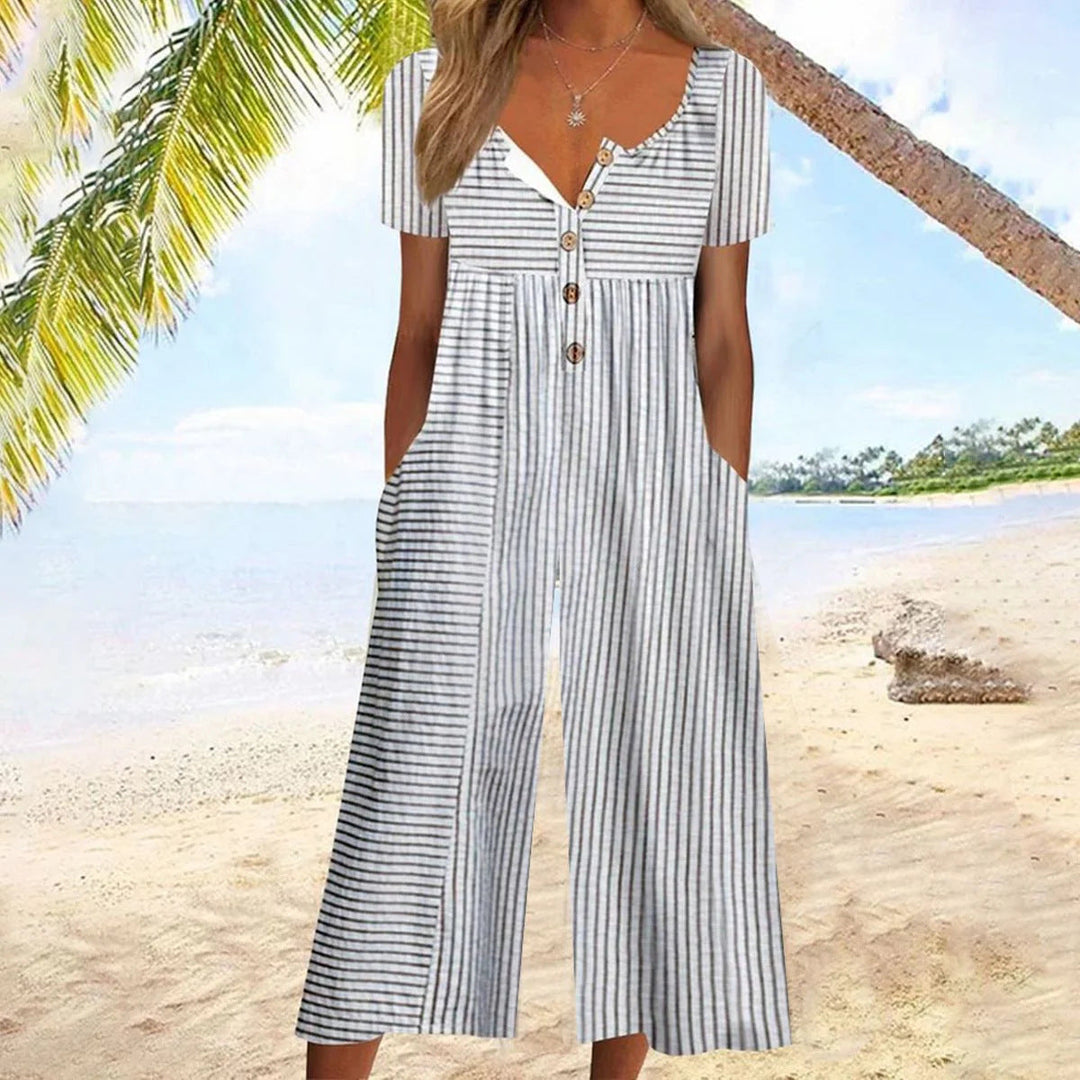 Mono de verano cómodo y sofisticado para mujer. Jumpsuit con escote V y pantalón ancho, estilo moderno.