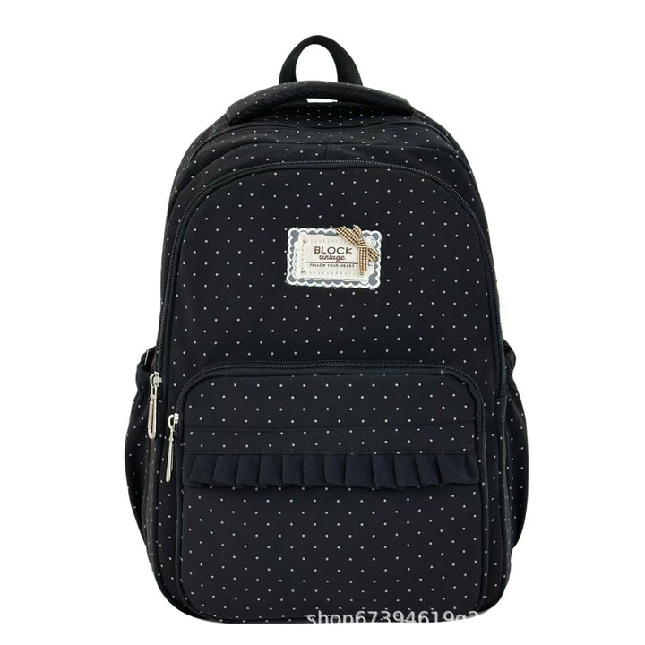 Mochila de mujer con volantes y lunares, ideal como accesorio de moda para cualquier ocasión.