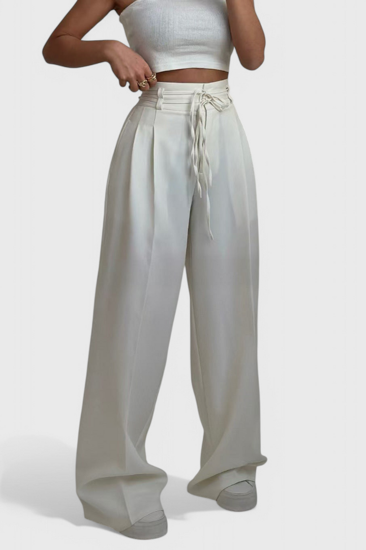 Pantalones de mujer anchos con cordones ajustables, diseño fluido y versátil para un confort diario.