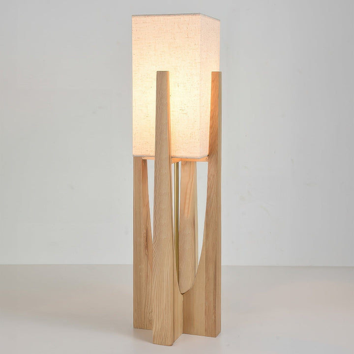 Lámpara de pie de nogal con pantalla de lino para un hogar moderno. Ilumina con estilo y funcionalidad.