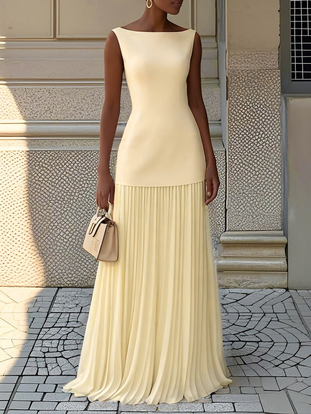 Vestido maxi plisado atemporal y chic para mujer, diseño fluido sin mangas, ideal para eventos de verano.