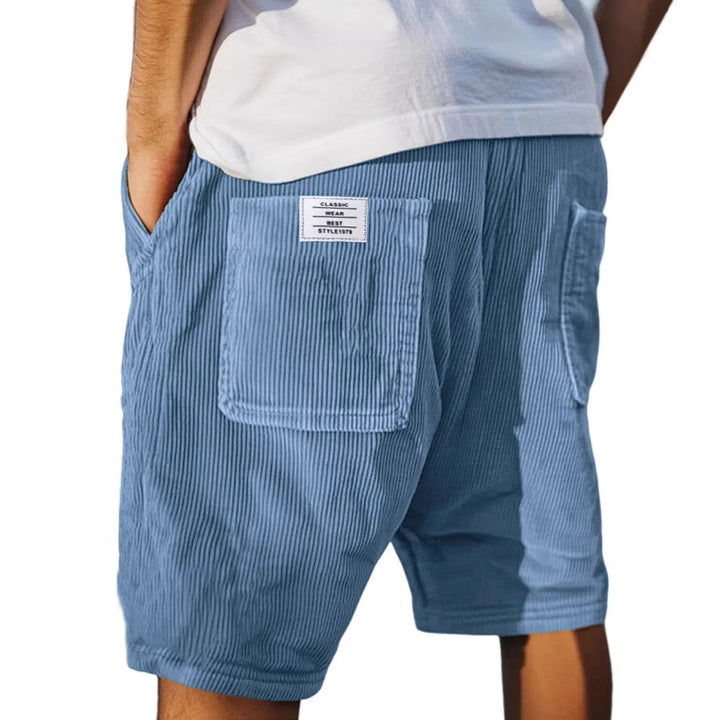 Short de terciopelo negro para hombre con bolsillos, moda casual-elegante. Ideal para el verano.