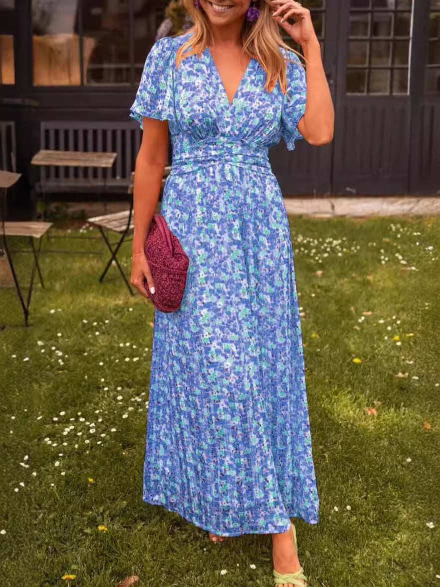 Detalle de vestido largo floral de mujer con tejido ligero. Estilo bohemio y fresco para el día a día.